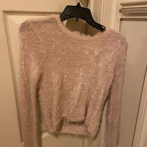 Light pink furry sweater.